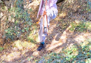 A pupils playing on a rope swing at Forest School
